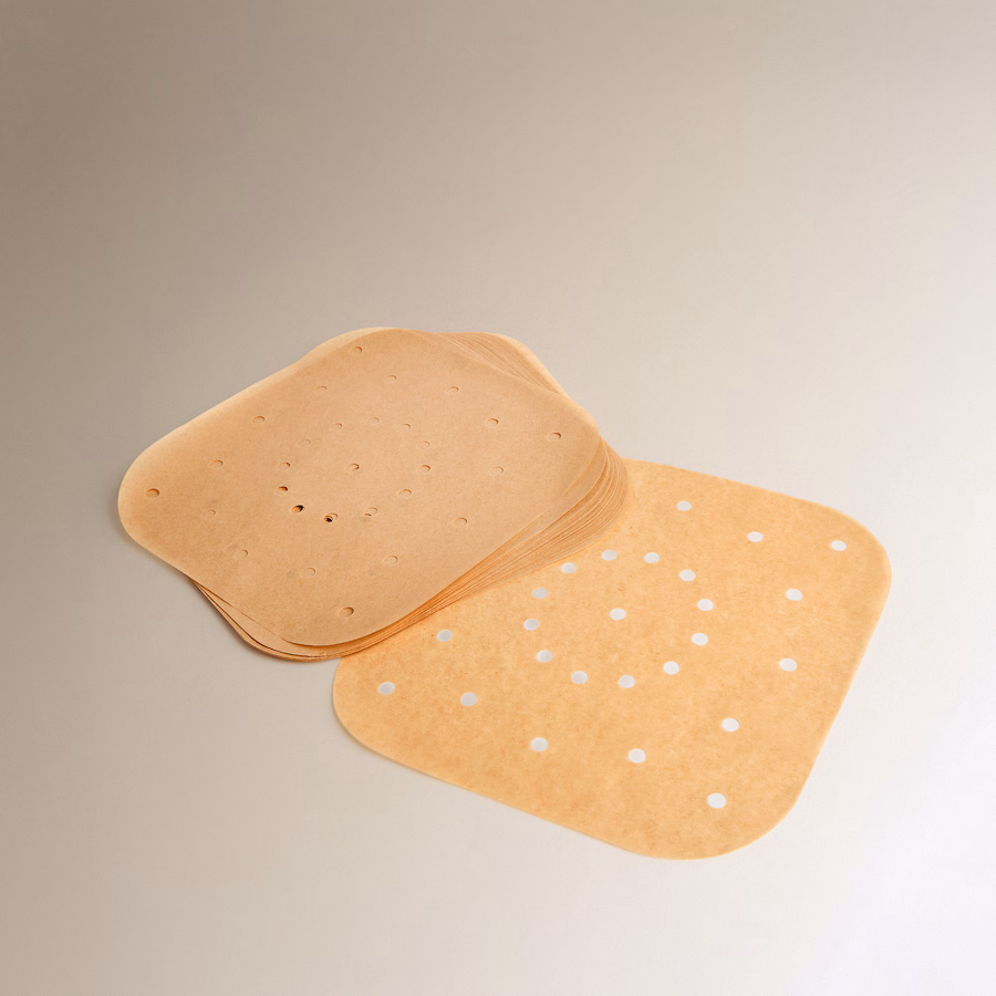Papel perforado protector y desechable para cesta de freidora de aire o air fryer